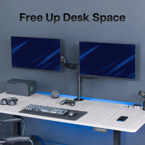 Zero Hassle Dual Monitor Mount For 17 To 32 Inch Screens With Slick Mechanical Spring Arms Full Tilt Swivel And Rotation Heavy Duty Vesa Desk Stand Featuring Quick C Clamp Or Grommet Hookup Top Shelf Black rig mounted on a desk with two monitors, freeing up workspace.