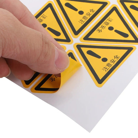 Applying 24 Pack Yellow PVC Safety Warning Sign Stickers For Machines And Equipment, Self Adhesive And Weather Resistant
