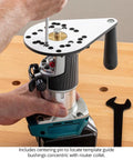 Close-up of Knockout Performance Phenolic Trim Router Base for Compact Palm Routers with a centering pin being adjusted.
