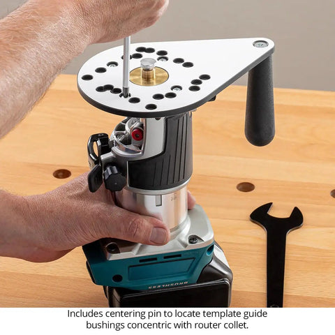 Close-up of Knockout Performance Phenolic Trim Router Base for Compact Palm Routers with a centering pin being adjusted.