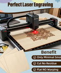 12-pack basswood sheets, 12x12x1/8 in, unfinished wood for laser engraving; sheet shown being etched.
