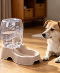 Set It And Forget It Gravity Pet Waterer Keeps Your Pooch Fully Hydrated With Large Capacity Plastic Bowl Featuring Non Slip Base And Whisper Quiet Auto Refill For Dogs And Cats In Beige next to a dog.