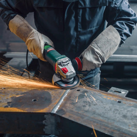 Worker using Beast Power 6 Inch 2000 Watt Brushless Angle Grinder For Industrial Use With Marathon Brushless Motor.