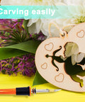 Honoson electric hot knife cutter with orange handle and metal tip, shown with a wooden heart stencil.