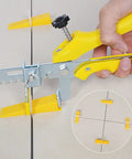 Pro Grade Tile Leveling System Kit With Pliers, 1500 Clips And 300 Reusable Wedges Plus Rubber Mallet in use on tiles