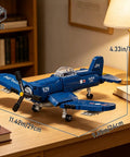 WW2 Military Airplane Building Kit Featuring F4U Corsair Fighter Jet Model Set with dimensions on wooden desk.