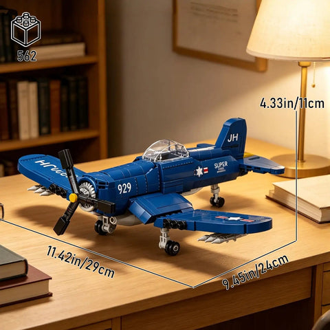 WW2 Military Airplane Building Kit Featuring F4U Corsair Fighter Jet Model Set with dimensions on wooden desk.