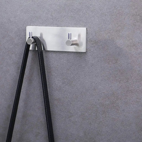 Heavy Duty Adhesive Wall Hooks That Are A Total Game Changer For Bathroom And Kitchen Organization Rust Proof Metal Hangers with black belt.