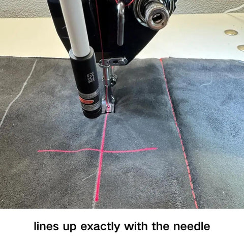 Crosshair Laser Alignment Tool For Heat Presses With Magnetic Base projecting red crosshair on fabric