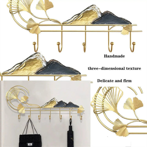 Modern Wall Mount Coat Rack Featuring Seven Heavy Duty Metal Hooks That Truly Knock Your Socks Off For Entryway Organization Hat Jacket Scarf Display, decorative gold and black design.