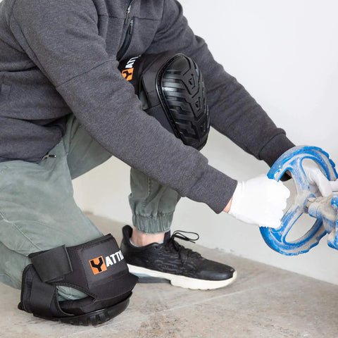 Person wearing heavy duty work knee pads with soft gel core and durable EVA foam padding, non slip ergonomic design with PVC caps.
