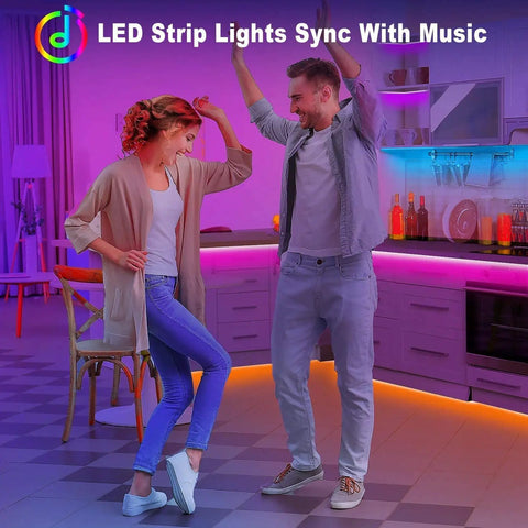 Couple enjoying 100Ft RGB LED Strip Lights Kit With 2 Rolls Of 50Ft in a kitchen with color changing ambiance for parties
