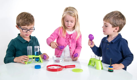 Kids using the Kids First Science Lab Kit For Preschoolers Ages 3 And Up With 24 Durable Colorful Plastic Tools in STEM experiments.