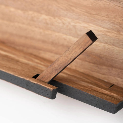 Close-up of walnut wood support on the Walnut Wood Cookbook Stand Hands Free Reading For Kitchen Tablet Holder Adjustable Book And Recipe Stand For Cooking Baking And Meal Prep Ideal Tablet And iPad Stand For Kitchen Counter.