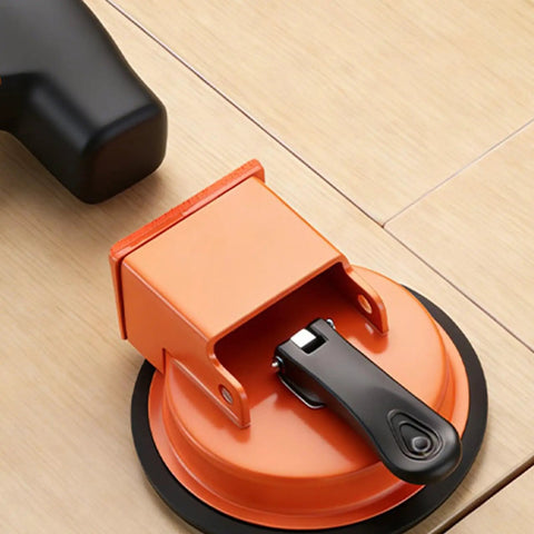 Close-up of Floor Suction Cup Tool Kit Pro Grade Heavy Duty For Quick Fix And Leveling Of Plank And Tile Flooring on wooden surface