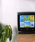 Notos 3 In 1 Weather Station For Indoor Outdoor Temperature Humidity And Wind Speed With Real Time Readings Plus Hyperlocal Forecast On An Illuminated Color Display on a shelf