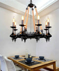 Rock Solid Industrial Chandelier features woven hemp rope and sturdy metal candle holders; adjustable pendant lighting over dining table.