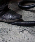 Person stepping on 50 Foot Ultra Flexible Crushproof Commercial Vacuum Hose 1.5 Inch Inner Diameter For Backpack and Canister Vacs