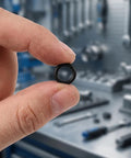 Person holding an O-ring from the 20-Piece Hydraulic Jack O-Ring Kit Rubber Seals For Bottle Jacks And Floor Jacks 0.7 Inch OD 0.5 Inch Lift