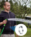 Man using hose outdoors with Adjustable Stainless Steel Hose Clamps Kit, 25 Pieces, Range 1/4 to 2 Inches inset image.
