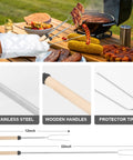 Camping Utensils Set With Storage Bag Portable Stainless Steel Cookware Gear For Outdoor Cooking Car Travel And RV Trips Includes Spatula Tongs Ladle Brush Peeler Meat Fork Skewers And Roasting Forks on grill.