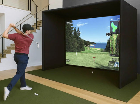 Person using Indoor Golf Simulator Enclosure Kit 10 X 8 Ft With 4K Ready Dual Layer Projection Screen and safety netting indoors