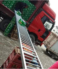 Straight Up Slick Lightweight Gravity Conveyor Roller System 40X150CM stainless steel slide unloading freight from truck.