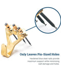 100 Lb Picture Hanging Hooks Set with nails showing pin-sized wall holes, perfect for drywall and plaster.