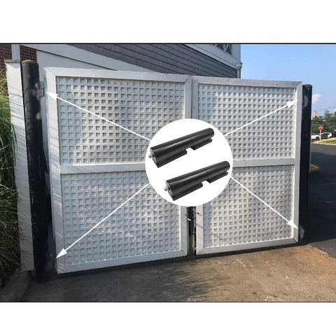 Two black 7-inch steel barrel gate hinges installed on a double metal gate (weld-on)