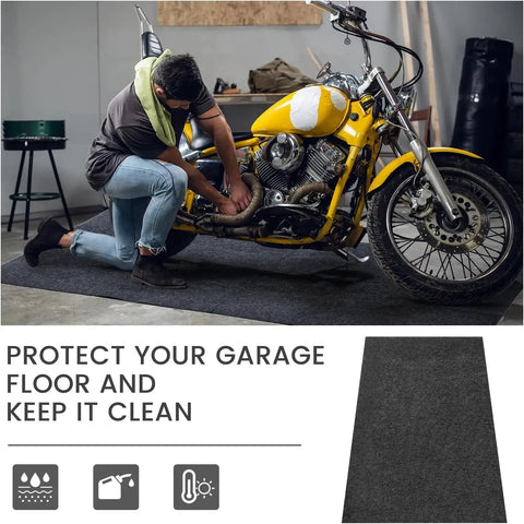 Motorcycle on 60 By 36 Inch Oil Spill Mat For Garages And Driveways catching leaks, heavy duty absorbent floor pad, waterproof backing