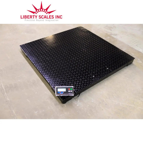 Heavy Workhorse Industrial Floor Scale For High Volume Warehouses With Sturdy 48 By 48 Inch Platform and digital readout on black steel deck.