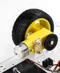 Close-up of Dope Smart Robot Car Chassis Kit With Motors Speed Encoder And Battery Box For DIY Projects Obstacle Avoidance.