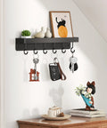 Dope Black Stainless Steel Key Holder With Shelf Wall Mount No Drill Self Adhesive Hooks Rack installed on a wall with keys