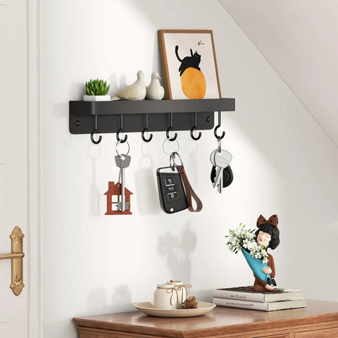 Dope Black Stainless Steel Key Holder With Shelf Wall Mount No Drill Self Adhesive Hooks Rack installed on a wall with keys