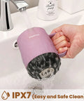 Smart Electric Heated Coffee Mug With Precision Temperature Setting And Rechargeable Coaster To Keep Your Daily Brew Piping Hot And Sipping Smooth On The Go 12 Oz Spill Resistant Travel Mug being rinsed under a faucet.