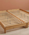 Heavy Duty Adjustable Bed Frame Support Legs With Center Slat Stabilizers That Lock Tight To Banish Every Wobble shown in slatted wood bed frame.