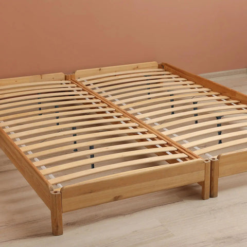 Heavy Duty Adjustable Bed Frame Support Legs With Center Slat Stabilizers That Lock Tight To Banish Every Wobble shown in slatted wood bed frame.