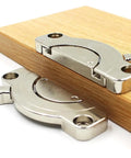 Say Bye To The Wiggle Heavy Duty Zinc Alloy Table Top Connectors With Secure Latch on wooden panel close-up.