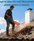 Man using Airflow Booster Turbo Extension for leaf blowers, fitting 2 to 4 inch nozzles, on roof for debris removal.