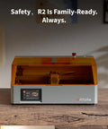 10W Enclosed Laser Engraver And Cutter With Smart Camera Positioning, batch engraving device on a wooden table, orange cover