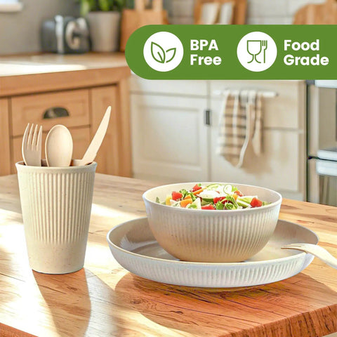 36 Piece Reusable Wheat Straw Dinnerware Set For Six With Plates, Bowls, Cups, And Utensils on a kitchen counter