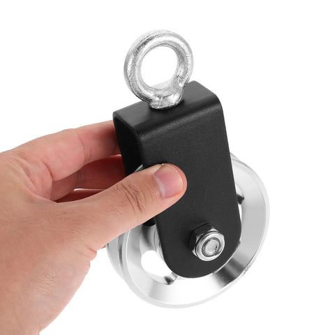 Beefed Up Heavy Duty Pulley Set For Home Gym Cable System With Aluminum Alloy Wheel, Strap And Carabiner, Smooth Bearing Design For DIY Strength Training And Replacement Pulleys, black pulley shown with metal eyelet and wheel