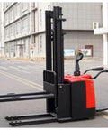 Walk Behind Powerhouse Electric Stacker Truck With Heavy Duty Hydraulic Lift For No Sweat Warehouse Loading And Smooth Material Handling Every Single Operation, side view on street.