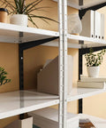 Black Twin Rail Wall Shelving System With Adjustable Twenty Five Inch Shelves And Eleven Point Five Inch Brackets Heavy Duty No Fuss DIY Ready Storage Rack for Kitchen Closet And Home Indoor Includes Rails Brackets And Screws Easy Install with plants and books on white shelves