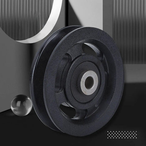 Heavy Duty Smooth Action Nylon Bearing Pulley Wheels 10 Pack With 90Mm Diameter And 10Mm Center Bore showing a close-up of a black nylon pulley.