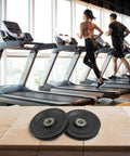 Beefy Nylon Bearing Pulley Wheel Black Smooth Finish 112.5mm Outer Diameter Two Pack Replacement Part in gym setting