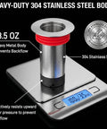 Heavy Duty 2 Inch Shower Floor Drain Stopper With Magnetic Backflow Preventer And Flexible Silicone Seals To Kick Those Funky Sewer Smells To The Curb And Keep Your Basement Floor Dry on a scale showing 3.5 oz.