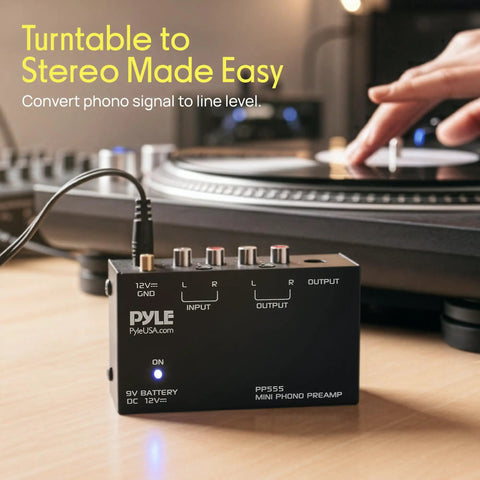 Pyle Phono Turntable Preamp Mini Electronic Audio Stereo Phonograph Preamplifier With 9V Battery Compartment, connecting to a turntable.