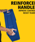 Person holding Slim Jim Plastic Rectangular Recycling Bin And Trash Can With Venting Channels 23 Gallon Blue featuring reinforced handles.