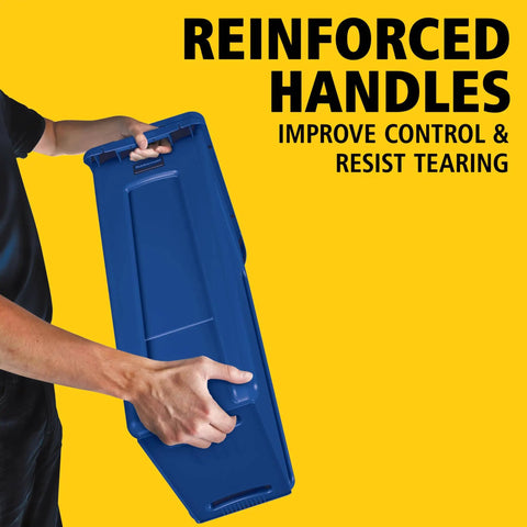 Person holding Slim Jim Plastic Rectangular Recycling Bin And Trash Can With Venting Channels 23 Gallon Blue featuring reinforced handles.